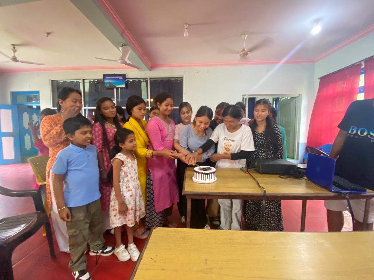 Nepal girls eating cake 17 2024-07-13 at 1.09.43 PM